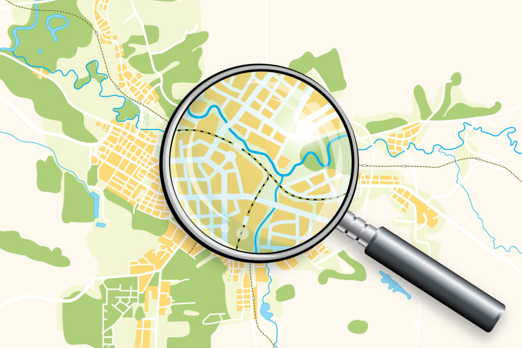 Map with a magnifying glass selecting road detail