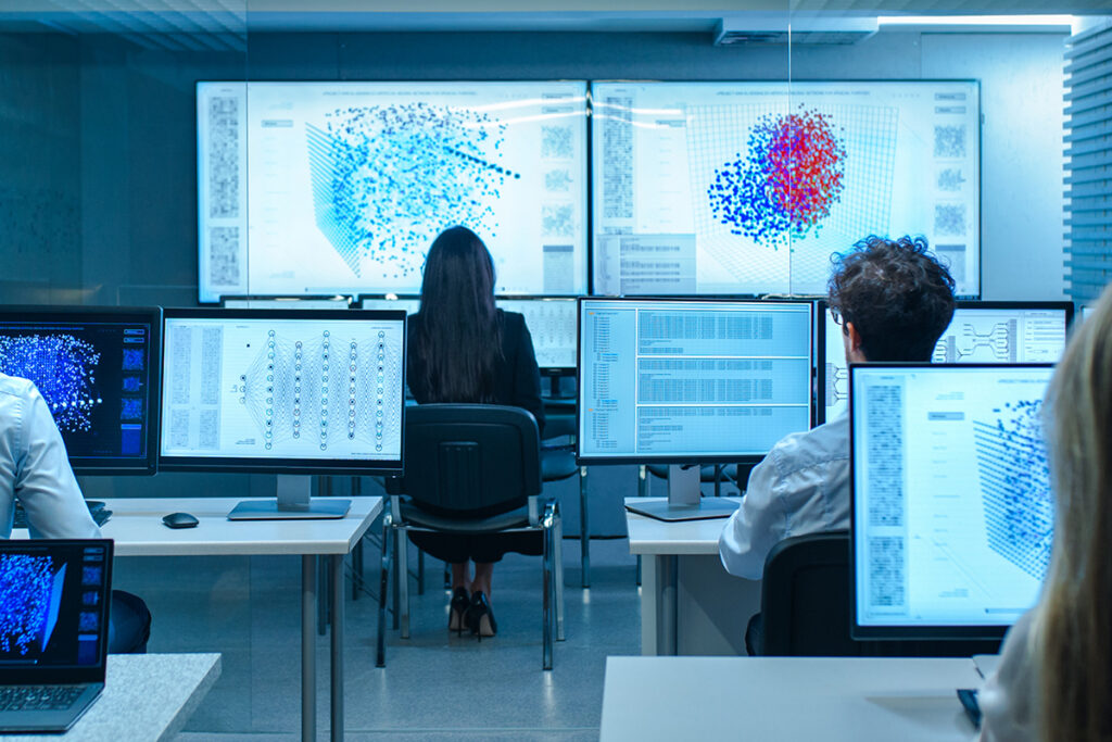 Team of Computer Engineers Work on Machine Learning Neural Network Technology Development.